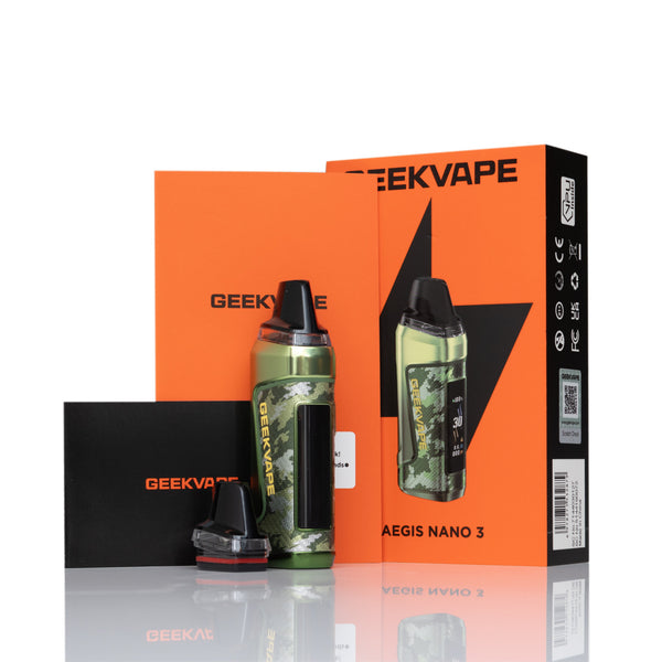 A GEEKVAPE AEGIS NANO 3 disposable vape device with a green camouflage pattern, shown alongside its orange retail packaging, a black accessory case, and a black card on a reflective white surface.