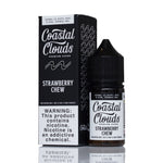 A bottle of Coastal Clouds Strawberry Chew e-liquid next to its black retail box, displayed on a reflective white surface.