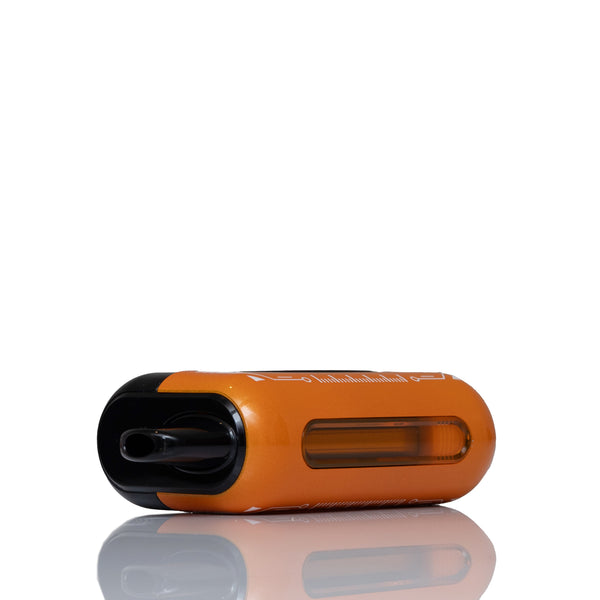 An orange disposable vape device with a black mouthpiece and a clear window showing the liquid inside, displayed on a reflective white surface against a white background.