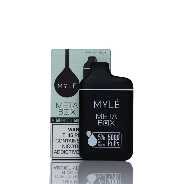 Mylé Meta Box disposable vape device in matte black standing in front of its light green and white packaging box on a reflective white surface.