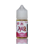 A bottle of Monster Vape Labs 'The Milk' Strawberry e-liquid, featuring a white plastic cap and a white label with red and pink graphics, set against a plain white background with a reflection below.