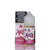 A bottle of Monster Vape Labs 'The Milk' Strawberry e-liquid next to its retail box, featuring a white and pink label with a prominent black warning label on the box.