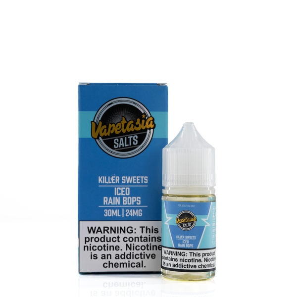 A blue vapetasia box with a nicotine warning and description of 30mL is placed next to a blue and white bottle with a white cap of iced rain bops flavor e-liquid